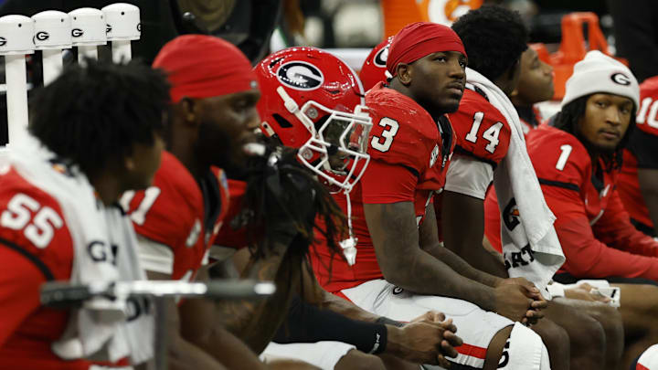 Jan 1, 2026; New Orleans, LA, USA; Georgia Bulldogs players sit on the bench in the final second in the fourth quarter against the Mississippi Rebels during the 2025 Sugar Bowl and quarterfinal game of the College Football Playoff at Caesars Superdome. Mandatory Credit: Geoff Burke-Imagn Images