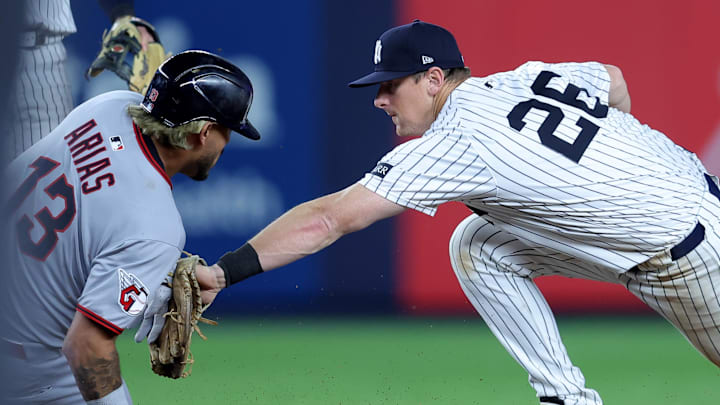 Jun 3, 2025; Bronx, New York, USA; New York Yankees second baseman DJ LeMahieu (26) tags out Cleveland Guardians shortstop Gabriel Arias (13) trying to stretch a single into a double during the seventh inning at Yankee Stadium. Mandatory Credit: Brad Penner-Imagn Images Jun 3, 2025; Bronx, New York, USA; New York Yankees second baseman DJ LeMahieu (26) tags out Cleveland Guardians shortstop Gabriel Arias (13) trying to stretch a single into a double during the seventh inning at Yankee Stadium. Mandatory Credit: Brad Penner-Imagn Images