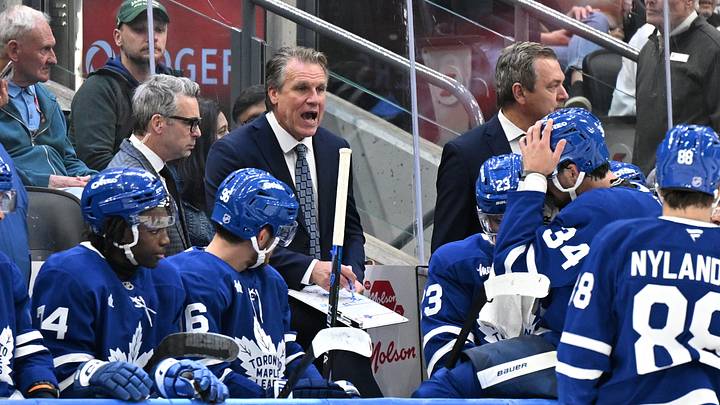 Sep 19, 2026; Toronto, Ontario, CAN;  Toronto Maple Leafs head coach Jim Hiller speaks to his players during a third-period timeout against the Montreal Canadiens at  Scotiabank Arena.  Mandatory Credit: Dan Hamilton-Imagn Images