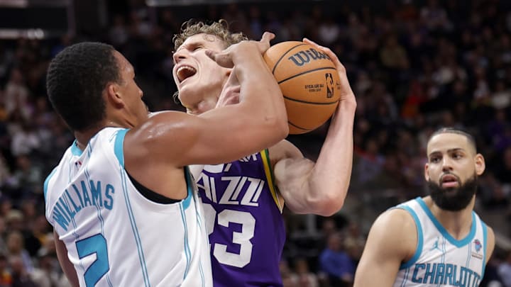 Feb 22, 2024; Salt Lake City, Utah, USA; Utah Jazz forward Lauri Markkanen (23) is fouled by Charlotte Hornets forward Grant Williams (2) during the second quarter at Delta Center. Mandatory Credit: Chris Nicoll-Imagn Images Feb 22, 2024; Salt Lake City, Utah, USA; Utah Jazz forward Lauri Markkanen (23) is fouled by Charlotte Hornets forward Grant Williams (2) during the second quarter at Delta Center. Mandatory Credit: Chris Nicoll-Imagn Images