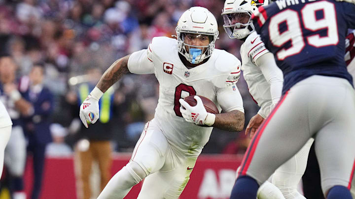 Arizona Cardinals running back James Conner (6) runs with the ball against the New England Patriots at State Farm Stadium on Dec. 15, 2024.