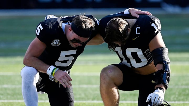 Vanderbilt wide receiver Richie Hoskins (5) and linebacker Langston Patterson (10) pray before their game against Auburn at FirstBank Stadium in Nashville, Tenn., Saturday, Nov. 7, 2025.