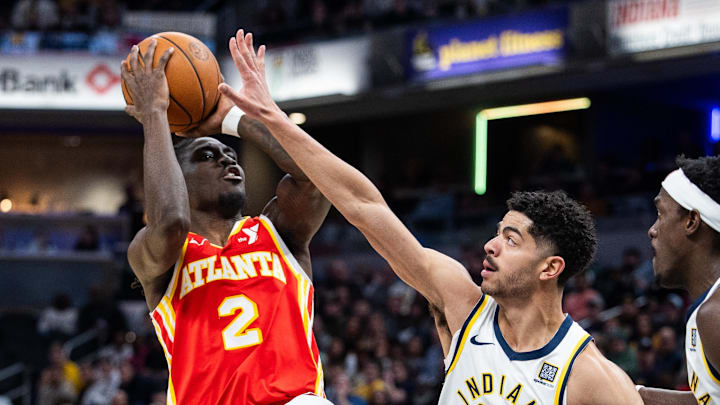 Feb 1, 2025; Indianapolis, Indiana, USA; Atlanta Hawks guard Keaton Wallace (2) shoots the ball against Indiana Pacers guard Ben Sheppard (26) in the first half at Gainbridge Fieldhouse. Mandatory Credit: Trevor Ruszkowski-Imagn Images