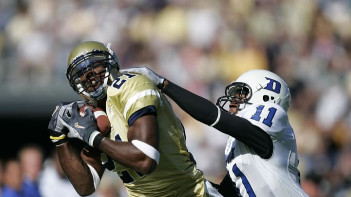 Nov 18, 2006; Atlanta, GA; Georgia Tech Yellow Jackets wide receiver (21) Calvin Johnson makes a long catch past Duke cornerback John Talley (11) in the first half of the game at Bobby-Dodd Stadium in Atlanta. Mandatory Credit: Christopher Gooley-USA TODAY Sports