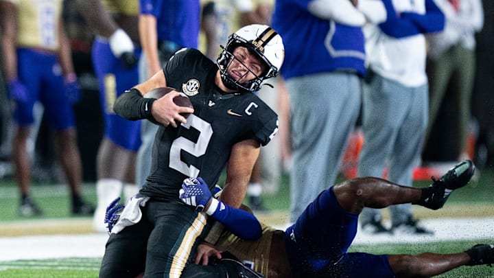 Vanderbilt Commodores quarterback Diego Pavia (2) is tackled by Alcorn State Braves defensive back Tayvion Haney (2) during their Southeastern Athletic Conference game at FirstBank Stadium in Nashville, Tenn., Saturday, Sept. 7, 2024.