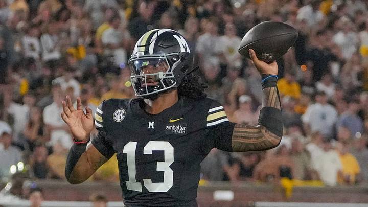 Sep 19, 2026; Columbia, Missouri, USA; Missouri Tigers quarterback Austin Simmons (13) throws a pass against the Troy Trojans during the first half of the game at Faurot Field at Memorial Stadium. Mandatory Credit: Denny Medley-Imagn Images Sep 19, 2026; Columbia, Missouri, USA; Missouri Tigers quarterback Austin Simmons (13) throws a pass against the Troy Trojans during the first half of the game at Faurot Field at Memorial Stadium. Mandatory Credit: Denny Medley-Imagn Images