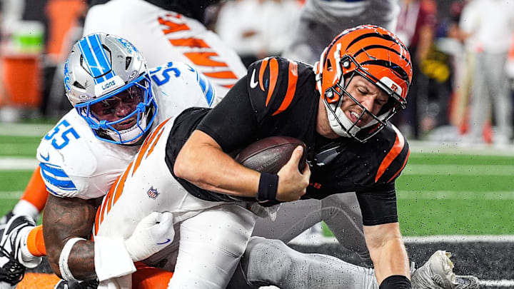 Bengals quarterback Jake Browning (6) is tackled by a safety by the Lions in Week 5.