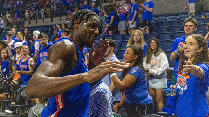 Florida center Rueben Chinyelu (9) dominated the glass and the paint as the Gators took down Tennessee.