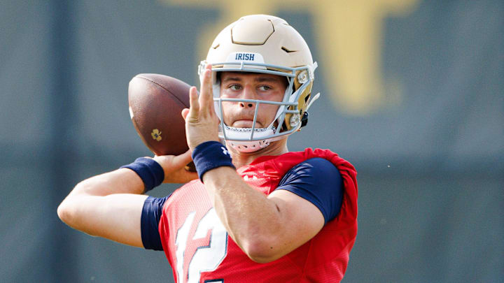Notre Dame quarterback CJ Carr throws the ball during a Notre Dame football practice at Irish Athletic Center on Wednesday, July 31, 2024, in South Bend.