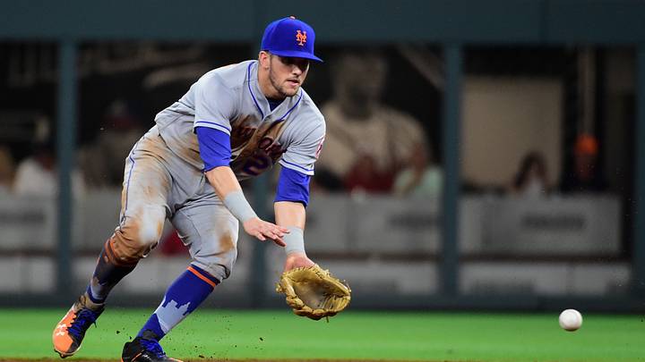 Sep 16, 2017; Atlanta, GA, USA; New York Mets second baseman Gavin Cecchini (2) fields a ground ball against the Atlanta Braves at SunTrust Park. Mandatory Credit: Adam Hagy-USA TODAY Sports Sep 16, 2017; Atlanta, GA, USA; New York Mets second baseman Gavin Cecchini (2) fields a ground ball against the Atlanta Braves at SunTrust Park. Mandatory Credit: Adam Hagy-USA TODAY Sports