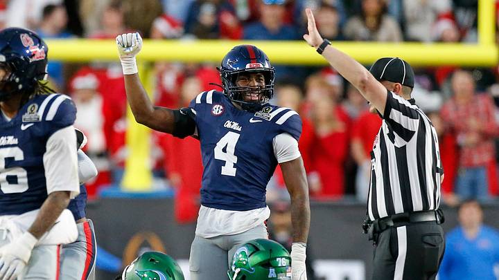 Mississippi Rebels linebacker Suntarine Perkins reacts after a turnover during the third quarter against the Tulane Green Wave at Vaught-Hemingway Stadium. Mississippi Rebels linebacker Suntarine Perkins reacts after a turnover during the third quarter against the Tulane Green Wave at Vaught-Hemingway Stadium.