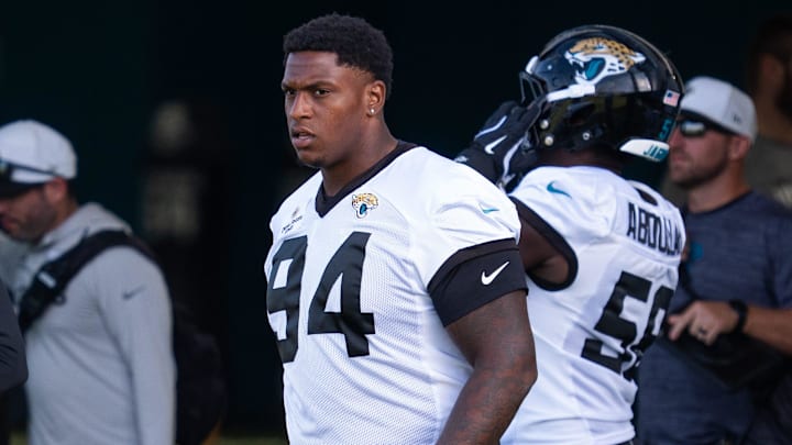 Jacksonville Jaguars defensive tackle Maason Smith (94) walks onto the field during the Jaguar’s 12th NFL training camp session at the Miller Electric Center, Thursday, Aug. 7, 2025, in Jacksonville, Fla. 