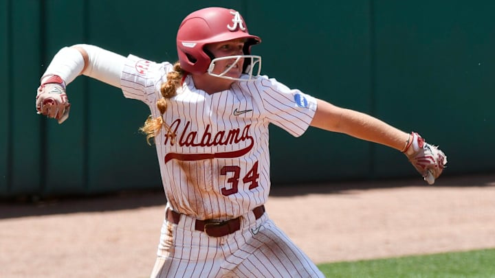 May 19 2024; Tuscaloosa, AL, USA; Alabama batter Marlie Giles (34) expresses her joy after reaching third on a double by a teammate May 19 2024; Tuscaloosa, AL, USA; Alabama batter Marlie Giles (34) expresses her joy after reaching third on a double by a teammate