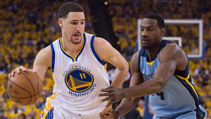 May 5, 2015; Oakland, CA, USA; Golden State Warriors guard Klay Thompson (11) dribbles against Memphis Grizzlies forward Tony Allen (9) during the first quarter in game two of the second round of the NBA Playoffs at Oracle Arena. Mandatory Credit: Kyle Terada-Imagn Images