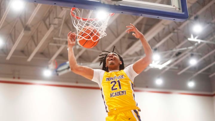 Montverde   s Kayden Allen (21) dunks the ball on a fast break against Whitehaven during a basketball game in the Winter Classic at the McDonald Insurance Arena on Friday, Feb. 09, 2024 in Bartlett, Tenn.