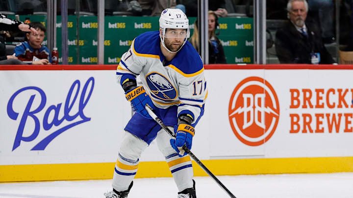 Jan 2, 2025; Denver, Colorado, USA; Buffalo Sabres left wing Jason Zucker (17) controls the puck in the first period against the Colorado Avalanche at Ball Arena. Mandatory Credit: Isaiah J. Downing-Imagn Images