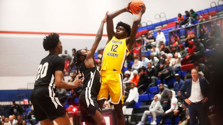 Caleb Gaskins (12), while playing for Montverde Academy last season, looks to pass the ball against White Haven. The 4-star recruit has announced he has transferred to Columbus for the 2024-25 season.
