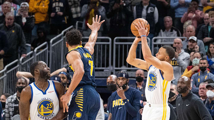Dec 13, 2021; Indianapolis, Indiana, USA; Golden State Warriors guard Stephen Curry (30) shoots the ball while Indiana Pacers guard Malcolm Brogdon (7) defends in the second half at Gainbridge Fieldhouse. Mandatory Credit: Trevor Ruszkowski-Imagn Images Dec 13, 2021; Indianapolis, Indiana, USA; Golden State Warriors guard Stephen Curry (30) shoots the ball while Indiana Pacers guard Malcolm Brogdon (7) defends in the second half at Gainbridge Fieldhouse. Mandatory Credit: Trevor Ruszkowski-Imagn Images