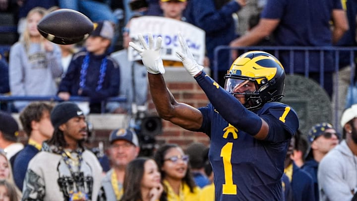Michigan wide receiver Donaven McCulley (1) warms up ahead of the New Mexico game at Michigan Stadium in Ann Arbor on Saturday, August 30, 2025.