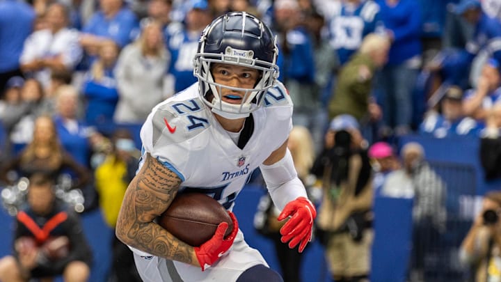 Oct 31, 2021; Indianapolis, Indiana, USA; Tennessee Titans cornerback Elijah Molden (24) intercepts the ball for a touchdown in the second half against the Indianapolis Colts at Lucas Oil Stadium. Mandatory Credit: Trevor Ruszkowski-Imagn Images Oct 31, 2021; Indianapolis, Indiana, USA; Tennessee Titans cornerback Elijah Molden (24) intercepts the ball for a touchdown in the second half against the Indianapolis Colts at Lucas Oil Stadium. Mandatory Credit: Trevor Ruszkowski-Imagn Images