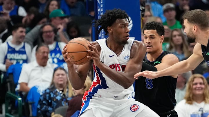 Apr 12, 2024; Dallas, Texas, USA; Detroit Pistons center James Wiseman (13) looks to score against Dallas Mavericks guard Josh Green (8) during the first half at American Airlines Center. Mandatory Credit: Chris Jones-USA TODAY Sports