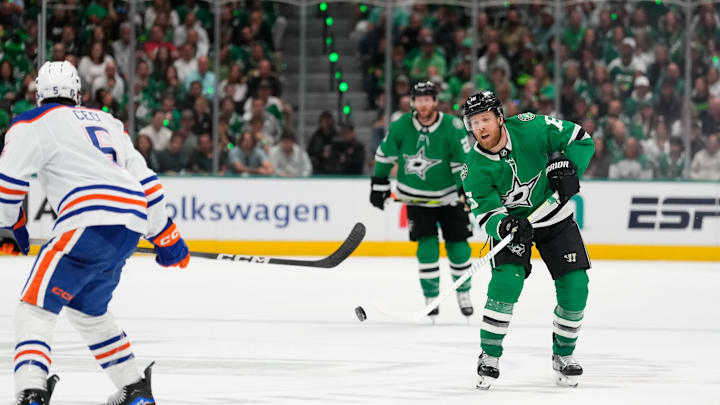 May 31, 2024; Dallas, Texas, USA; Dallas Stars center Sam Steel (18) passes the puck against Edmonton Oilers defenseman Cody Ceci (5) during the second period between the Dallas Stars and the Edmonton Oilers in game five of the Western Conference Final of the 2024 Stanley Cup Playoffs at American Airlines Center. Mandatory Credit: Chris Jones-USA TODAY Sports