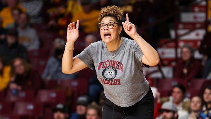 Feb 20, 2024; Minneapolis, Minnesota, USA; Wisconsin Badgers head coach Marisa Moseley calls a play during the second half against the Minnesota Golden Gophers at Williams Arena. Mandatory Credit: Matt Krohn-Imagn Images