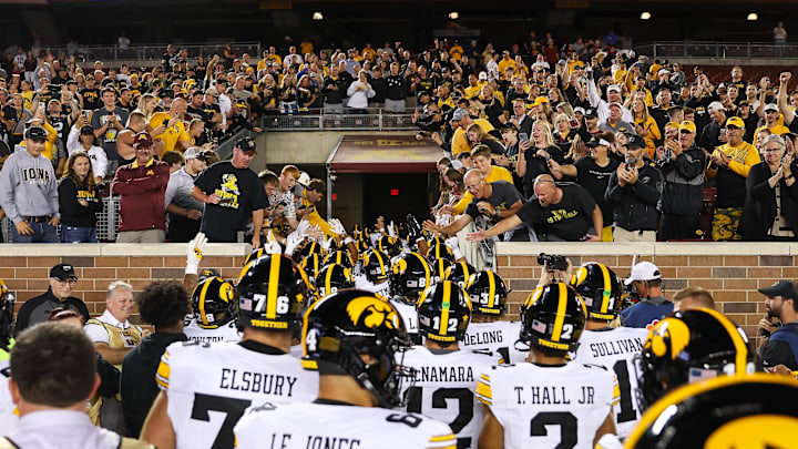 Sep 21, 2024; Minneapolis, Minnesota, USA; Iowa Hawkeyes players head back down the tunnel after their win against the Minnesota Golden Gophers at Huntington Bank Stadium. Mandatory Credit: Matt Krohn-Imagn Images