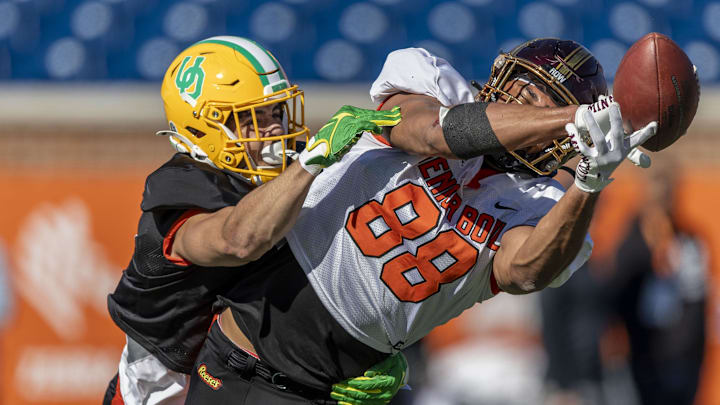 Jan 31, 2024; Mobile, AL, USA; National tight end Brevyn Spann-Ford of Minnesota (88) can't make a play around Oregon's Evan Williams.