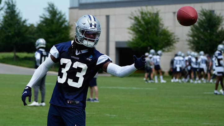 Jun 5, 2024; Frisco, TX, USA;  Dallas Cowboys safety Julius Wood (33) goes through a drill during practice at the Ford Center at the Star Training Facility in Frisco, Texas.