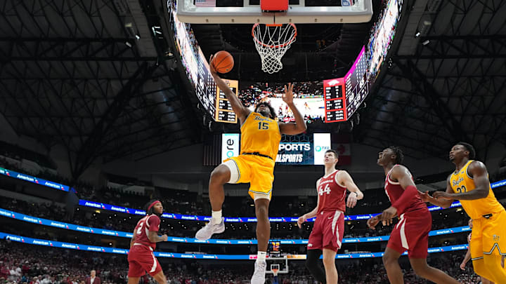 Nov 9, 2024; Dallas, Texas, USA; Baylor Bears forward Norchad Omier (15) scores a basket ahead of Arkansas Razorbacks forward Zvonimir Ivisic (44)  during the second half at American Airlines Center. Mandatory Credit: Chris Jones-Imagn Images