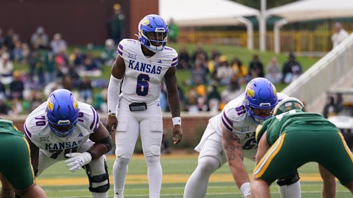 Nov 30, 2024; Waco, Texas, USA;  Kansas Jayhawks quarterback Jalon Daniels (6) calls an audible at the line against the Baylor Bears during the first half at McLane Stadium. Mandatory Credit: Chris Jones-Imagn Images