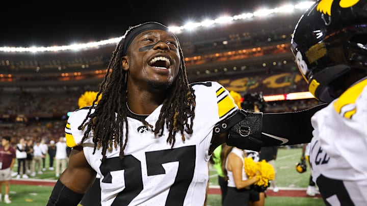 Sep 21, 2024; Minneapolis, Minnesota, USA; Iowa Hawkeyes defensive back Jermari Harris (27) celebrates his teams win after the game against the Minnesota Golden Gophers at Huntington Bank Stadium. Mandatory Credit: Matt Krohn-Imagn Images