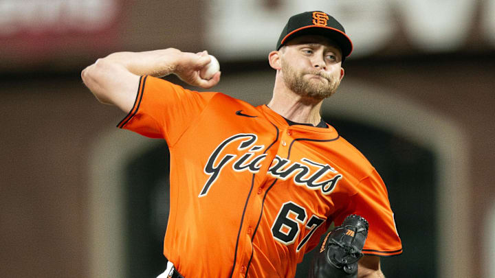 Aug 29, 2025; San Francisco, California, USA; San Francisco Giants pitcher Keaton Winn (67) delivers a pitch against the Baltimore Orioles during the eighth inning at Oracle Park. Mandatory Credit: D. Ross Cameron-Imagn Images