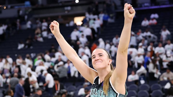 Oct 16, 2024; Minneapolis, Minnesota, USA; New York Liberty guard Sabrina Ionescu (20) celebrates her teams win after game three of the 2024 NBA Finals against the Minnesota Lynx at Target Center. Mandatory Credit: Matt Krohn-Imagn Images