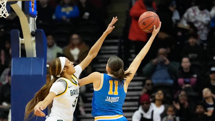 Jan 20, 2025; Newark, New Jersey, USA;  UCLA Bruins guard Gabriela Jaquez (11) scores a basket against Baylor Lady Bears guard Darianna Littlepage-Buggs (5) during the first half at Prudential Center. Mandatory Credit: Chris Jones-Imagn Images