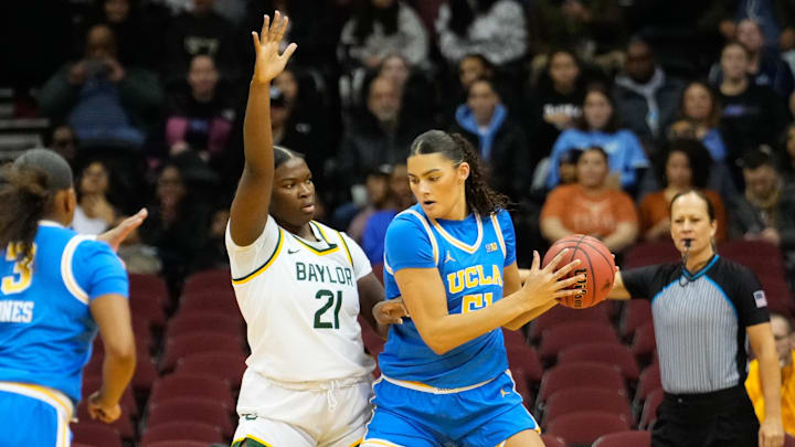 Jan 20, 2025; Newark, New Jersey, USA;  UCLA Bruins center Lauren Betts (51) looks to score as Baylor Lady Bears center Aaronette Vonleh (21) defends during the first half at Prudential Center. Mandatory Credit: Chris Jones-Imagn Images