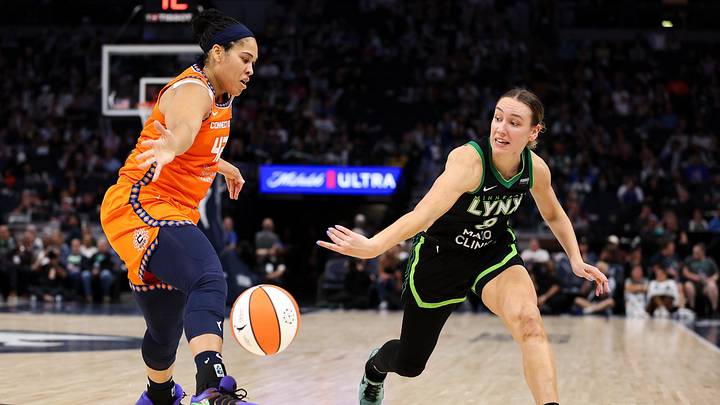 Sep 29, 2024; Minneapolis, Minnesota, USA; Minnesota Lynx forward Alanna Smith (8) passes as Connecticut Sun forward Brionna Jones (42) defends during the second half of game one of the 2024 WNBA Semi-finals at Target Center. Mandatory Credit: Matt Krohn-Imagn Images Sep 29, 2024; Minneapolis, Minnesota, USA; Minnesota Lynx forward Alanna Smith (8) passes as Connecticut Sun forward Brionna Jones (42) defends during the second half of game one of the 2024 WNBA Semi-finals at Target Center. Mandatory Credit: Matt Krohn-Imagn Images