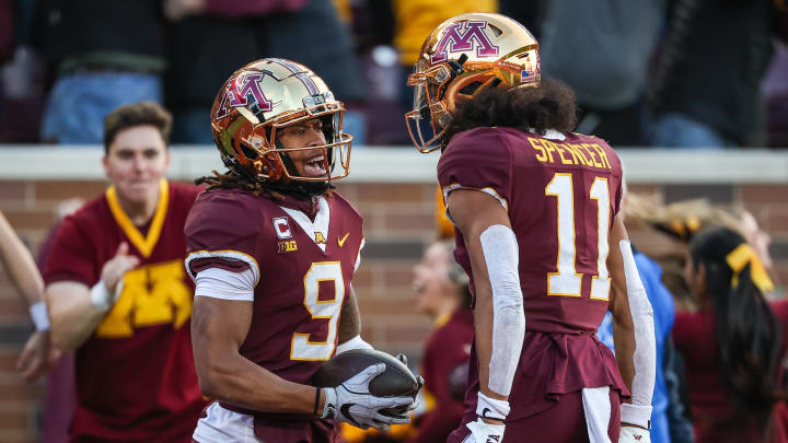 Nov 4, 2023; Minneapolis, Minnesota, USA; Minnesota Golden Gophers wide receiver Daniel Jackson (9) celebrates his touchdown catch with wide receiver Elijah Spencer (11) during the second half against the Illinois Fighting Illini at Huntington Bank Stadium. Mandatory Credit: Matt Krohn-USA TODAY Sports