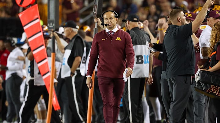 Sep 21, 2024; Minneapolis, Minnesota, USA; Minnesota Golden Gophers head coach P.J. Fleck looks on during the second half against the Iowa Hawkeyes at Huntington Bank Stadium. Mandatory Credit: Matt Krohn-Imagn Images