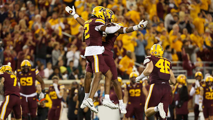 Oct 5, 2024; Minneapolis, Minnesota, USA; Minnesota Golden Gophers defensive back Ethan Robinson (2) celebrates his fumble recovery against the USC Trojans during the first half at Huntington Bank Stadium. Mandatory Credit: Matt Krohn-Imagn Images