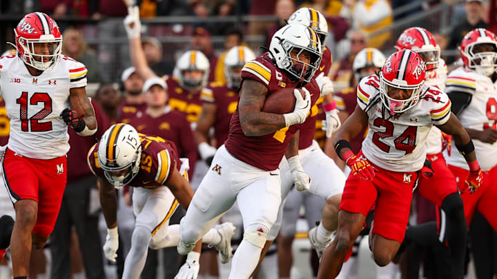 Oct 26, 2024; Minneapolis, Minnesota, USA; Minnesota Golden Gophers running back Darius Taylor (1) runs the ball against the Maryland Terrapins during the second half at Huntington Bank Stadium. Mandatory Credit: Matt Krohn-Imagn Images