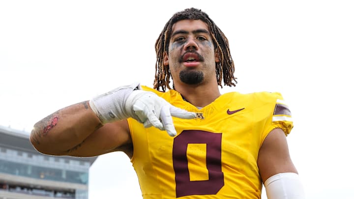 Sep 14, 2024; Minneapolis, Minnesota, USA; Minnesota Golden Gophers defensive lineman Anthony Smith (0) celebrates his teams win against the Nevada Wolf Pack after the game at Huntington Bank Stadium. Mandatory Credit: Matt Krohn-Imagn Images