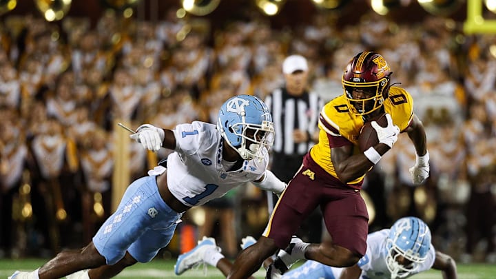 Aug 29, 2024; Minneapolis, Minnesota, USA; Minnesota Golden Gophers wide receiver Le'Meke Brockington (0) runs after catching a pass as North Carolina Tar Heels defensive back Antavious Lane (1) defends during the second half at Huntington Bank Stadium. Mandatory Credit: Matt Krohn-Imagn Images Aug 29, 2024; Minneapolis, Minnesota, USA; Minnesota Golden Gophers wide receiver Le'Meke Brockington (0) runs after catching a pass as North Carolina Tar Heels defensive back Antavious Lane (1) defends during the second half at Huntington Bank Stadium. Mandatory Credit: Matt Krohn-Imagn Images