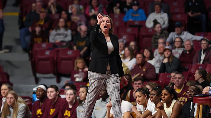 Jan 31, 2024; Minneapolis, Minnesota, USA; Minnesota Golden Gophers head coach Dawn Plitzuweit reacts during the first half against the Penn State Nittany Lions at Williams Arena. Mandatory Credit: Matt Krohn-Imagn Images Jan 31, 2024; Minneapolis, Minnesota, USA; Minnesota Golden Gophers head coach Dawn Plitzuweit reacts during the first half against the Penn State Nittany Lions at Williams Arena. Mandatory Credit: Matt Krohn-Imagn Images