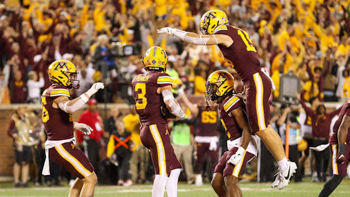 Oct 5, 2024; Minneapolis, Minnesota, USA; Minnesota Golden Gophers defensive back Koi Perich (3) celebrates his interception during the second half against the USC Trojans at Huntington Bank Stadium. Mandatory Credit: Matt Krohn-Imagn Images