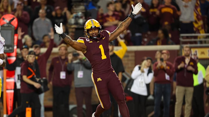 Oct 5, 2024; Minneapolis, Minnesota, USA; Minnesota Golden Gophers running back Darius Taylor (1) celebrates quarterback Max Brosmer's (16) touchdown against the USC Trojans during the first half at Huntington Bank Stadium. Mandatory Credit: Matt Krohn-Imagn Images Oct 5, 2024; Minneapolis, Minnesota, USA; Minnesota Golden Gophers running back Darius Taylor (1) celebrates quarterback Max Brosmer's (16) touchdown against the USC Trojans during the first half at Huntington Bank Stadium. Mandatory Credit: Matt Krohn-Imagn Images