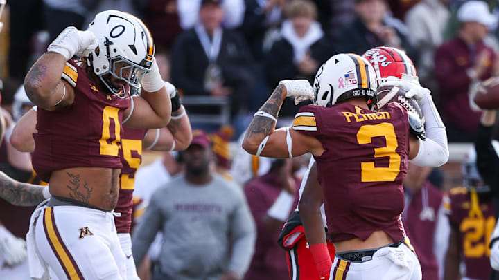 Oct 26, 2024; Minneapolis, Minnesota, USA; Minnesota Golden Gophers defensive back Koi Perich (3) celebrates after intercepting a pass against the Maryland Terrapins during the first half at Huntington Bank Stadium. Mandatory Credit: Matt Krohn-Imagn Images