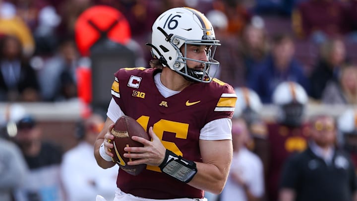 Oct 26, 2024; Minneapolis, Minnesota, USA; Minnesota Golden Gophers quarterback Max Brosmer (16) takes snap during the first half against the Maryland Terrapins at Huntington Bank Stadium. Mandatory Credit: Matt Krohn-Imagn Images Oct 26, 2024; Minneapolis, Minnesota, USA; Minnesota Golden Gophers quarterback Max Brosmer (16) takes snap during the first half against the Maryland Terrapins at Huntington Bank Stadium. Mandatory Credit: Matt Krohn-Imagn Images