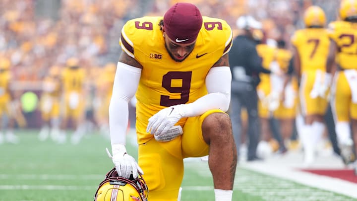 Sep 14, 2024; Minneapolis, Minnesota, USA; Minnesota Golden Gophers linebacker Devon Williams (9) takes a moment to himself before the game against the Nevada Wolf Pack at Huntington Bank Stadium. Mandatory Credit: Matt Krohn-Imagn Images